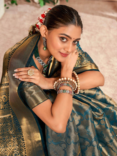 Fascinating Teal Blue Zari Weaving Silk Event Wear Saree With Blouse